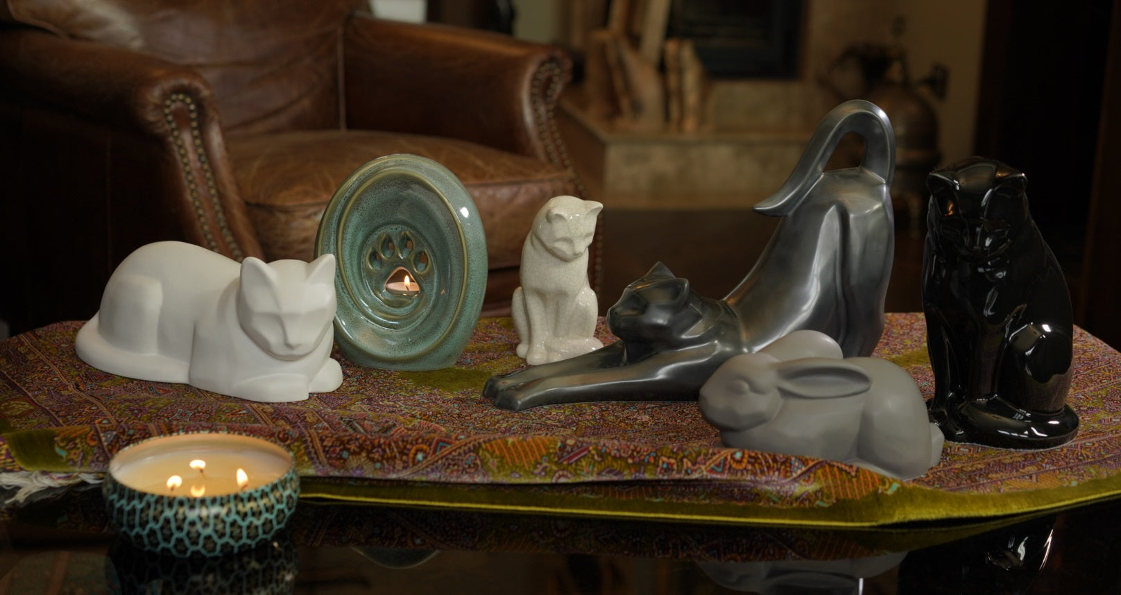 Pet Urns For Ashes by Pulvis Art Urns. Photo of Paw Dog urn and Neko cat urn in Dark Matte Color.